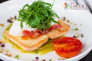 Poached eggs with Avocado, Bacon, Tomato and Rocket