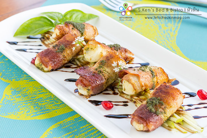 Grilled pesto marinated mozzarella wrapped in bacon